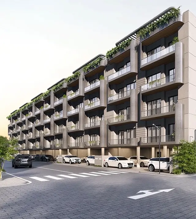 Ganga Kashi Residences — low-rise blocks along the internal road